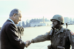 soldier shaking President Johnson's hand